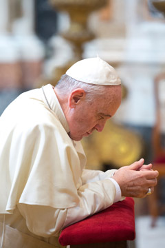 Pope Francis prays in front of the icon of 