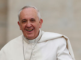 Pope Francis smiles as he arrives to lead his general audience in St. Peter's Square at the Vatican Feb. 19, 2014. CNS photo/Paul Haring
