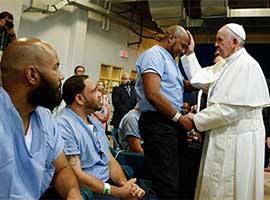 Pope Francis blesses an inmate at the Curran-Fromhold Correctional Facility in Philadelphia in September, 2015. CNS Photo/Paul Haring
