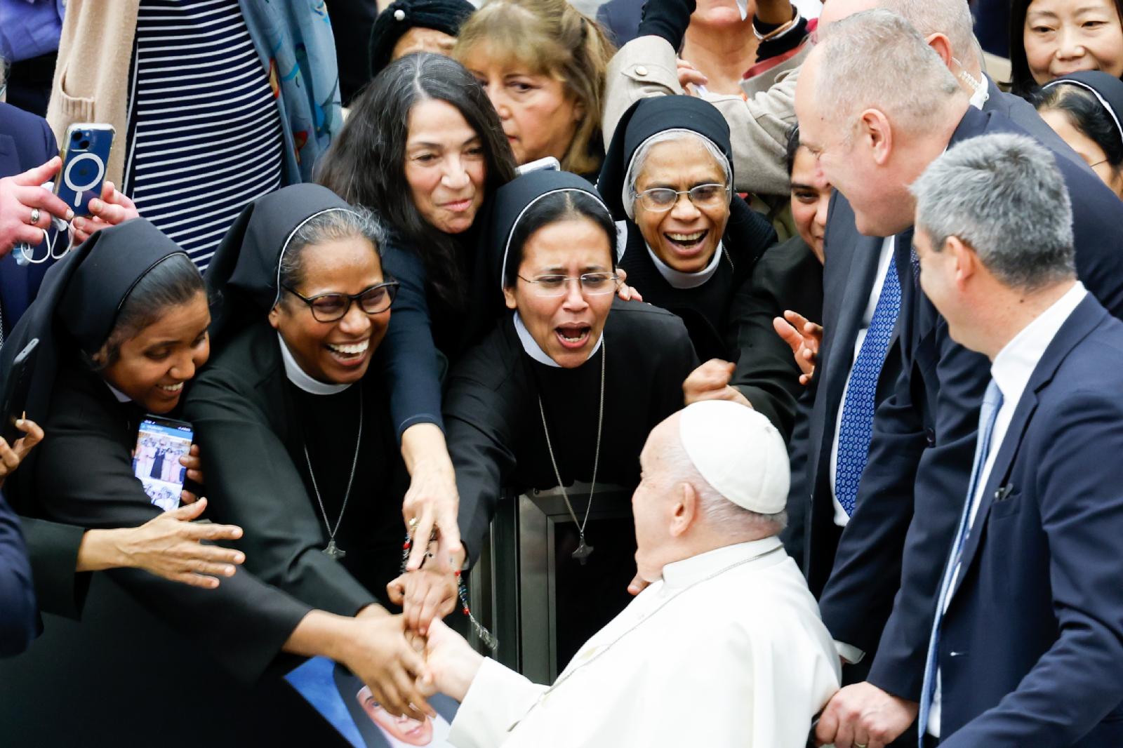 Pope Francis greets sisters