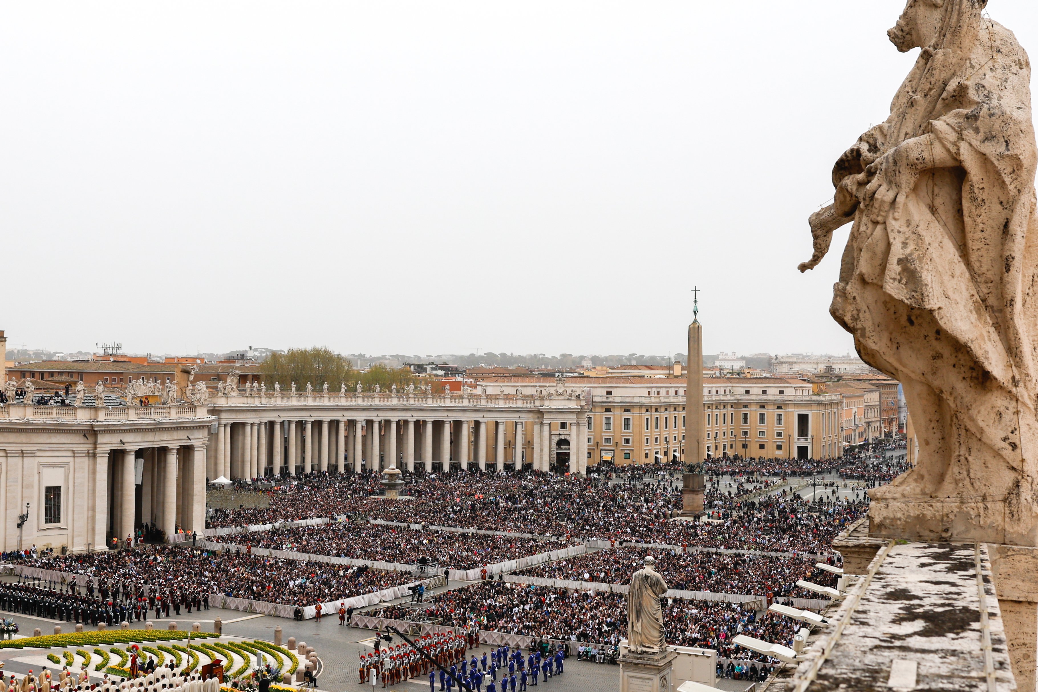 A crowd gathers in St. Peter's Square.