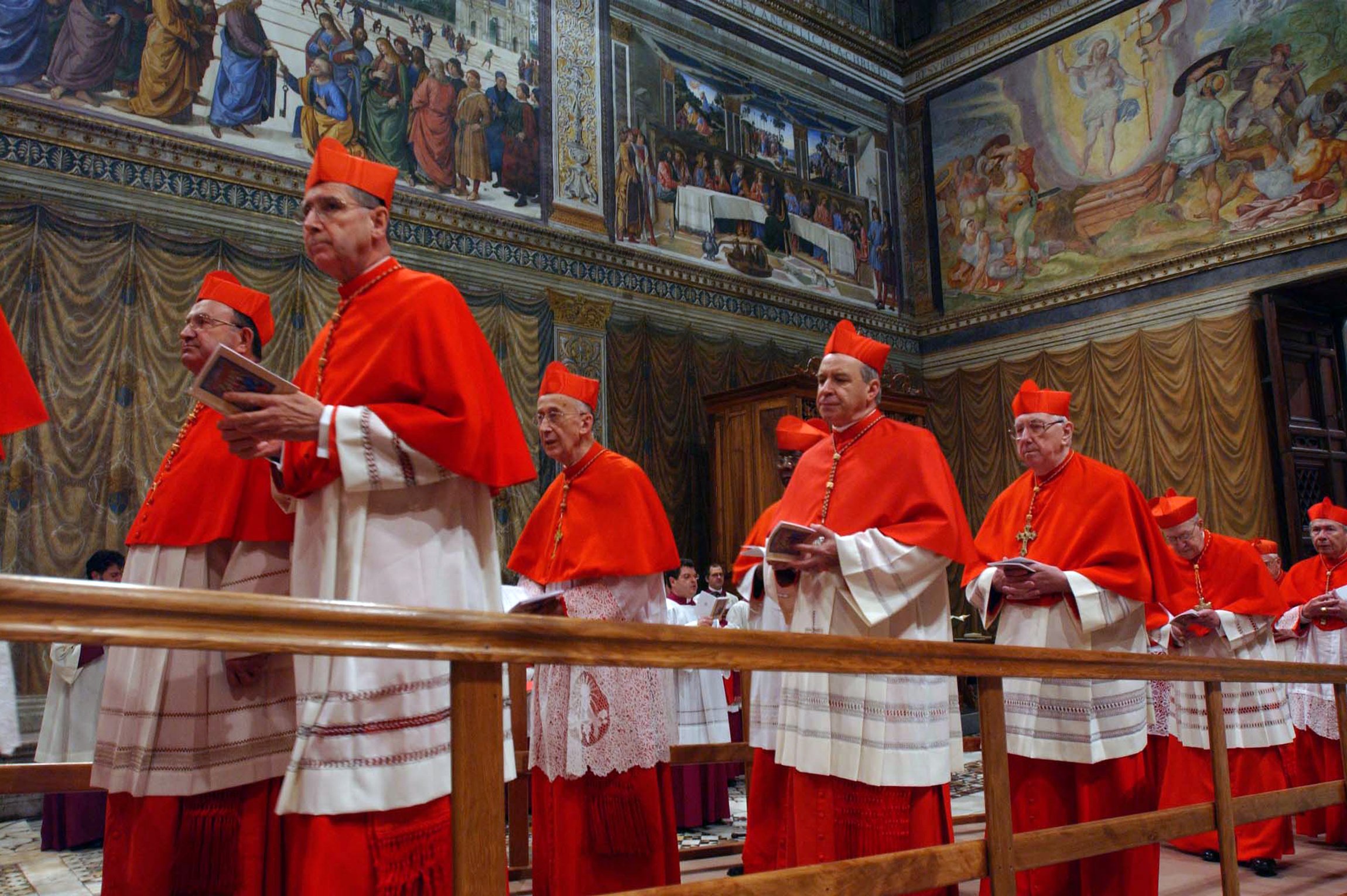 Cardinals enter the Sistine Chapel at the beginning of the conclave at the Vatican.