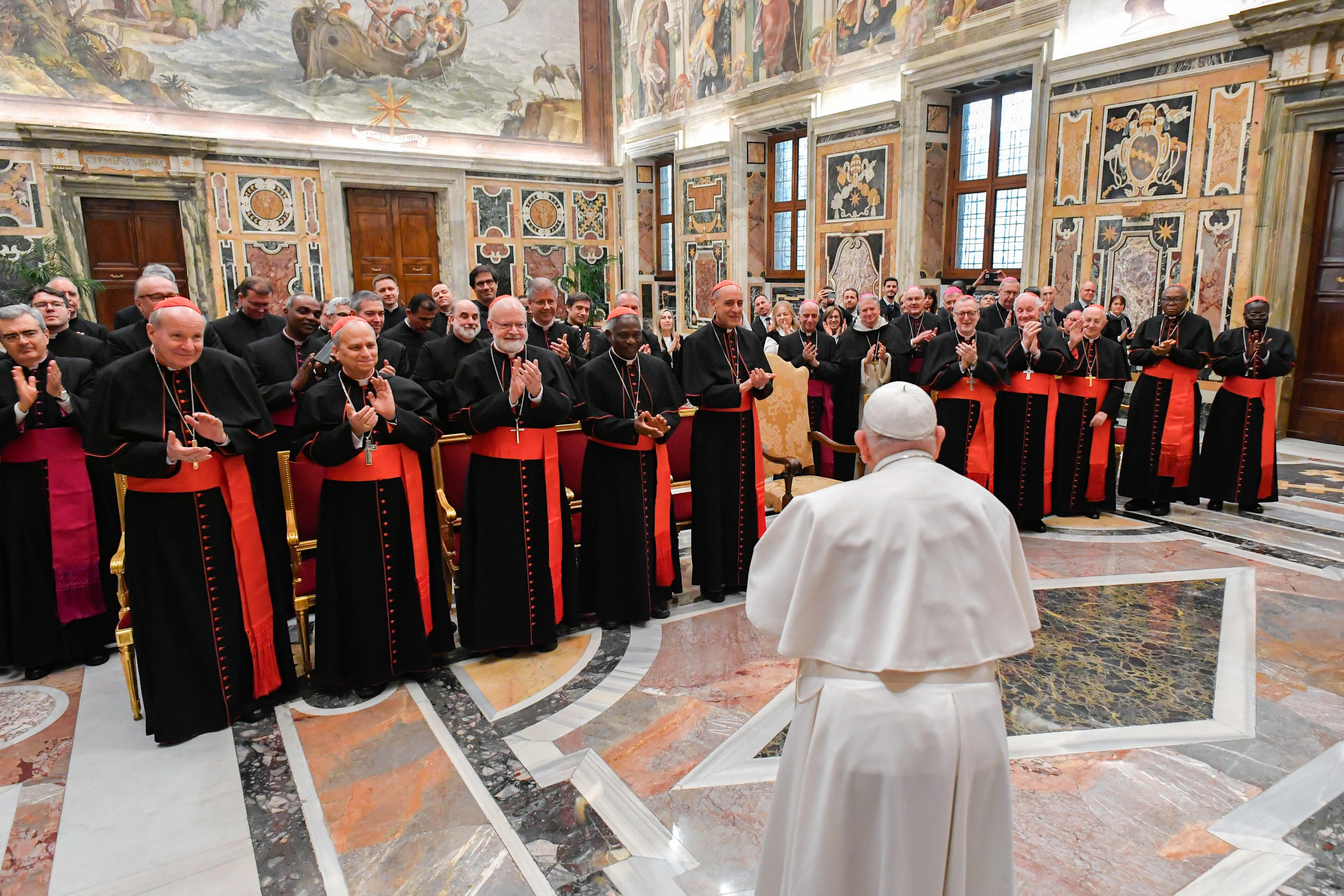 Pope Francis with members of the doctrinal dicastery