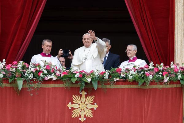 Pope Francis greets visitors in St. Peter's Square.
