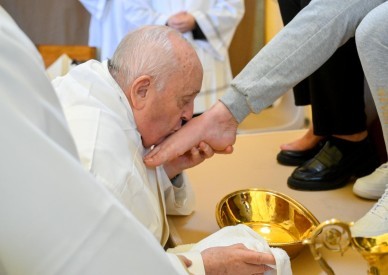 Tears flow as pope washes feet of women inmates at Rome prison