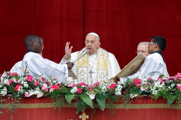 Pope Francis delivers his Easter blessing "urbi et orbi" (to the city and the world).